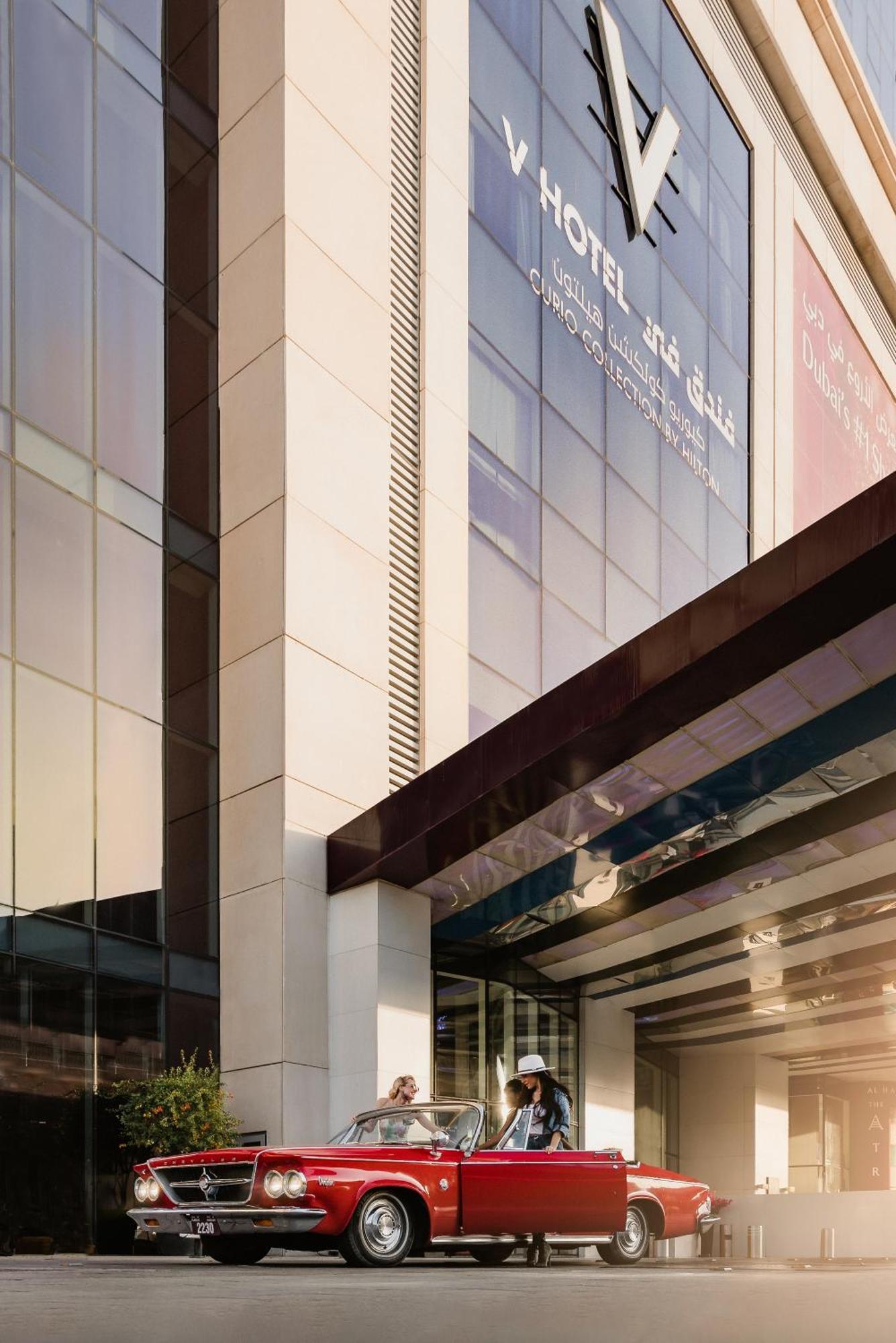 V Hotel Dubai, Curio Collection By Hilton Екстериор снимка The exterior of the building